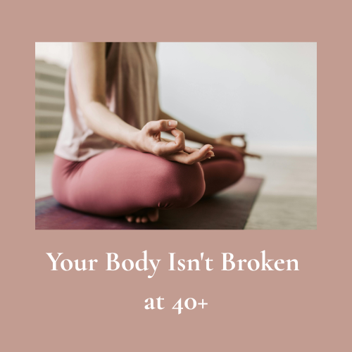 Woman sitting peacefully with hands on her abdomen reflecting on her fertility over 40 motherhood journey and holistic fertility practices.