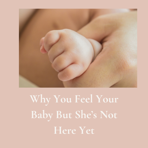 Woman in soft light holding her womb in a calm moment representing fertility over 40 and inner connection